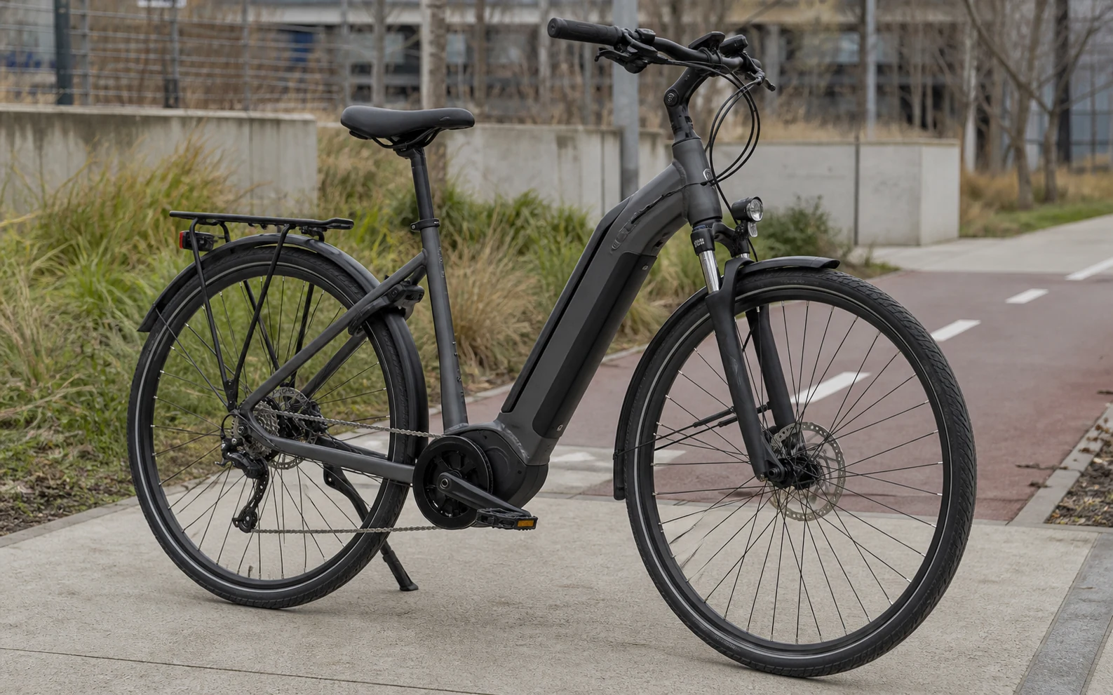 Premium commuter e-bike beside a European urban cycle route